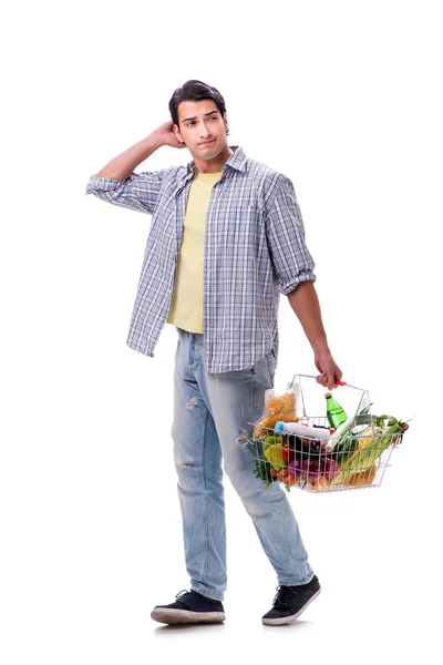 Jeune homme avec son épicerie sur blanc — Photo