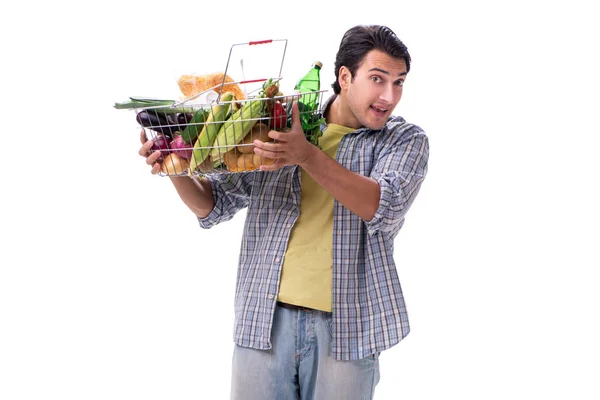 Jeune homme avec son épicerie sur blanc — Photo