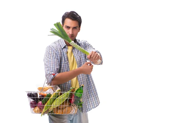 Joven con su tienda de comestibles en blanco — Foto de Stock