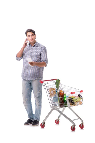 Jonge man met supermarkt kar trolley op wit — Stockfoto