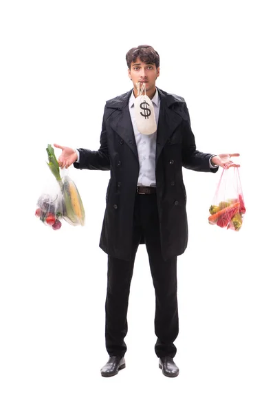 Giovane bell'uomo con verdure nel concetto di shopping — Foto Stock