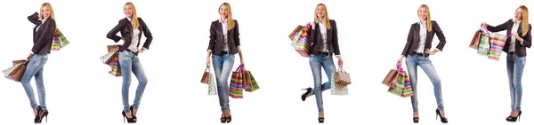 Beautiful woman with shopping bags isolated on white — Stock Photo, Image