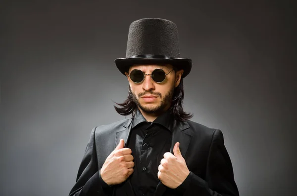Vintage concept with man wearing black top hat — Stock Photo, Image