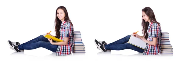 Giovane studente con libri isolati sul bianco — Foto Stock