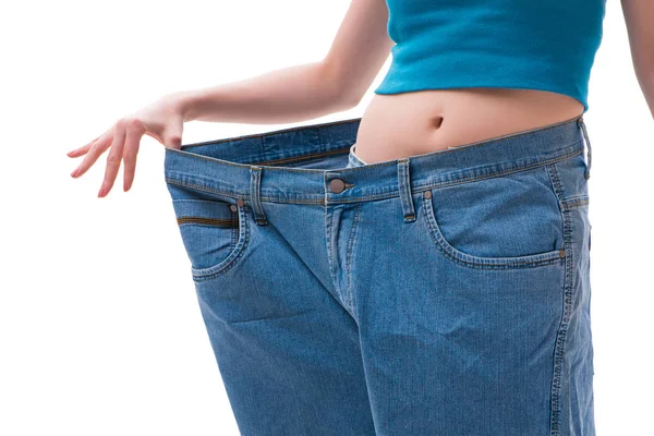 Concept of dieting with oversized jeans — Stock Photo, Image