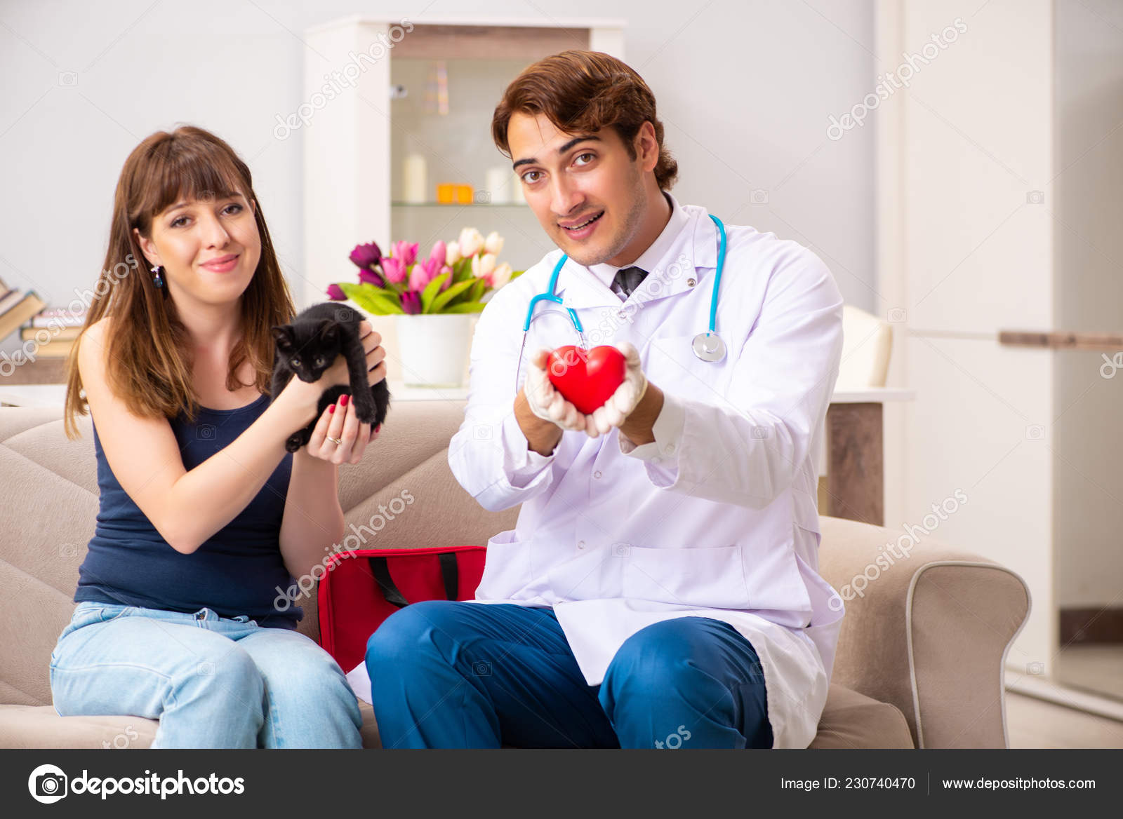 Vet doctor visiting sick kittens at home Stock Photo by ©Elnur_ 230740470
