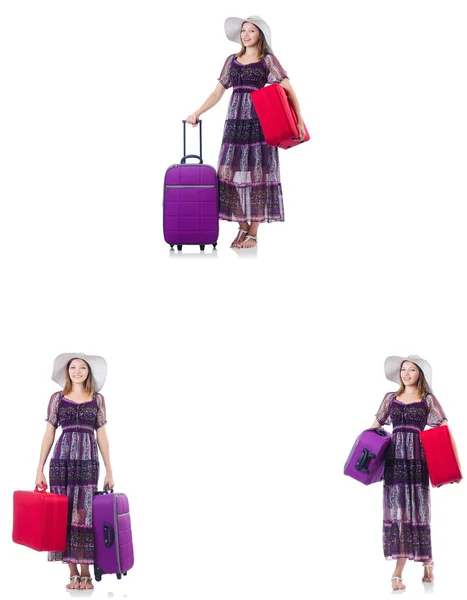 Mladá žena s kufry izolované na bílém — Stock fotografie