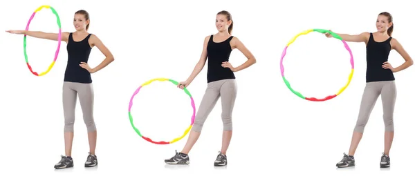 Giovane donna con hula hoop isolato su bianco — Foto Stock