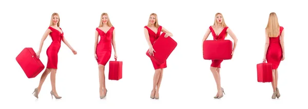 Loira em vestido vermelho com mala isolada em branco — Fotografia de Stock