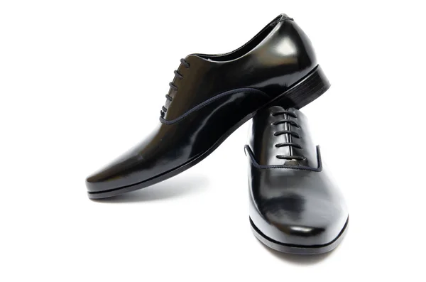 Zapatos negros aislados sobre fondo blanco — Foto de Stock