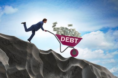 İş adamı, dolarlarla el arabasını yokuş aşağı itiyor