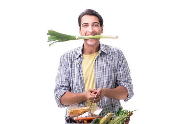 Joven con su tienda de comestibles en blanco — Foto de Stock