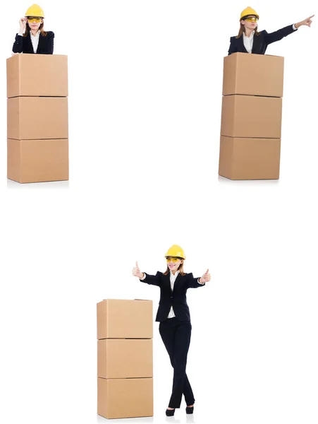 Woman builder with box isolated on white — Stock Photo, Image