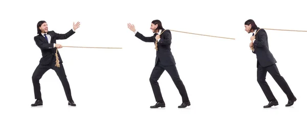 Young businessman pulling rope isolated on white — Stock Photo, Image