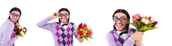 Homem segurando tulipas isolado no branco — Fotografia de Stock