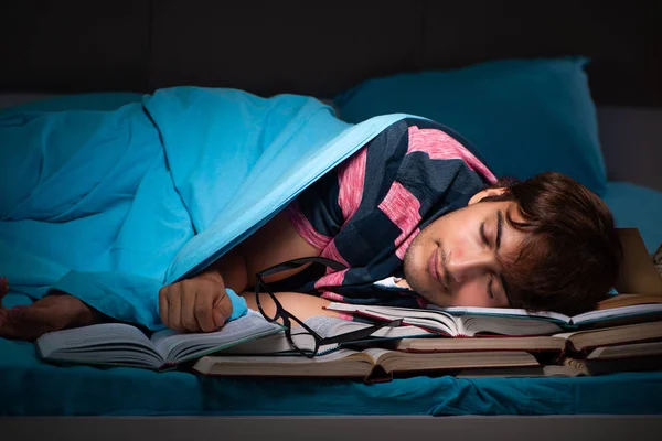 Young student preparing for exams at night at home — Stock Photo, Image