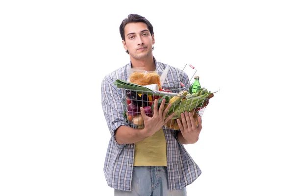 Jeune homme avec son épicerie sur blanc — Photo