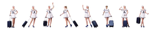 Reisebegleiterin mit Koffer auf weißem Grund — Stockfoto