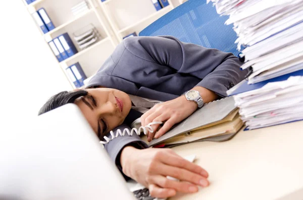 Middle aged businesslady unhappy with excessive work — Stock Photo, Image