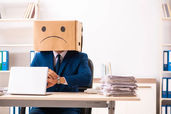 Unhappy man employee with box instead of his head — Stock Photo, Image