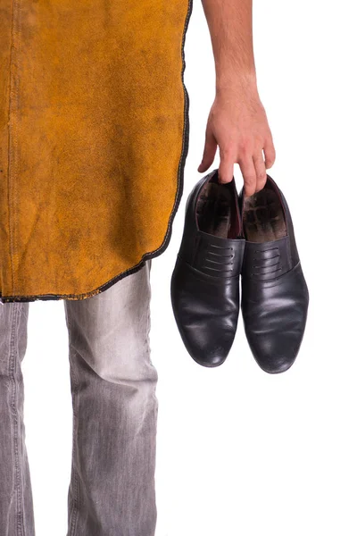 Young handsome shoemaker isolated on white — Stock Photo, Image