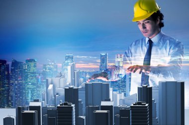 Gelecekçi mimar şehir planlaması yapıyor.