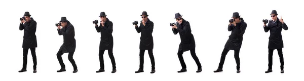 Espião com câmera tirando fotos isoladas no branco — Fotografia de Stock