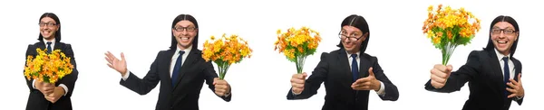 Hombre de negocios guapo con flor aislada en blanco — Foto de Stock