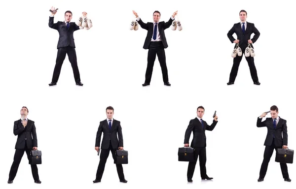 Businessman with money sacks, briefcase and handgun — Stock Photo, Image