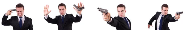 Hombre de traje con pistola aislada en blanco — Foto de Stock