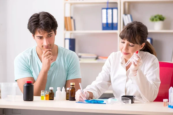 Doctor getting saliva test sample in clinic hospital