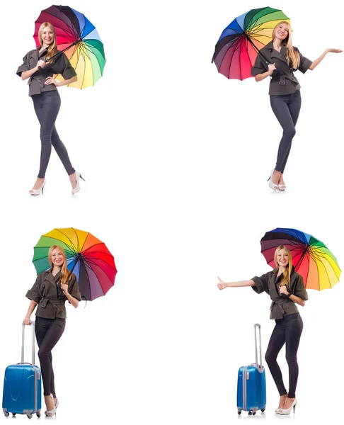 Frau mit Koffer und Regenschirm isoliert auf weißem Grund — Stockfoto
