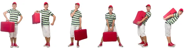 Młody człowiek z czerwoną walizką odizolowany na białym — Zdjęcie stockowe