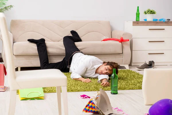 Young man having hangover after party — Stock Photo, Image