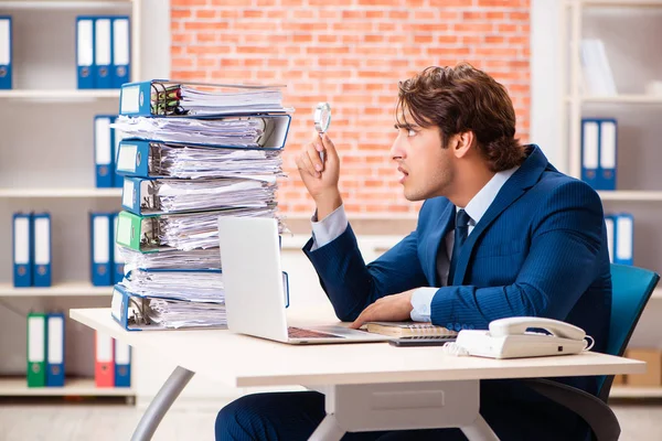 Young elegant man unhappy with too much work — Stock Photo, Image