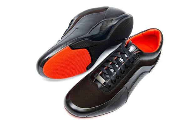 Sapatos esportivos pretos isolados no fundo branco — Fotografia de Stock