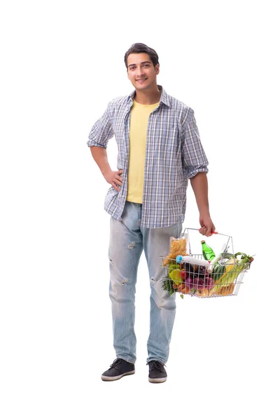 Mladý muž se svým nákupem potravin na bílém — Stock fotografie