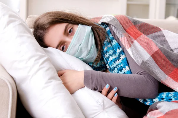 Sick young woman suffering at home — Stock Photo, Image