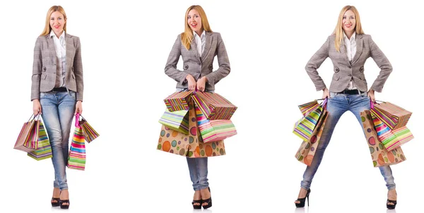 Beautiful woman with shopping bags isolated on white — Stock Photo, Image