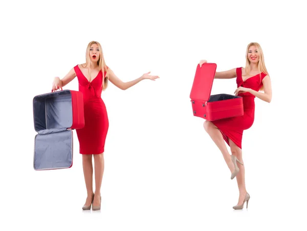 Mulher de vestido vermelho e caixa de viagem isolado em branco — Fotografia de Stock