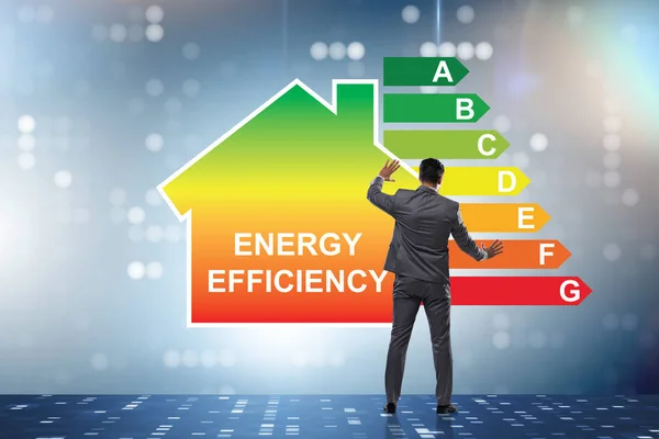 Бизнесмен в концепции энергоэффективности — стоковое фото