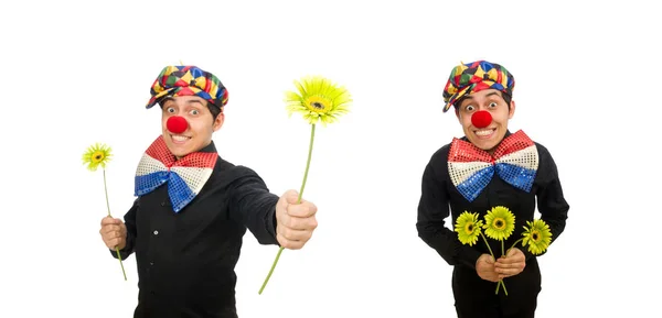 Lustiger Clown mit Blumen isoliert auf weiß — Stockfoto