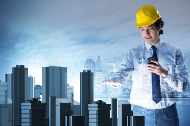 Gelecekçi mimar şehir planlaması yapıyor.