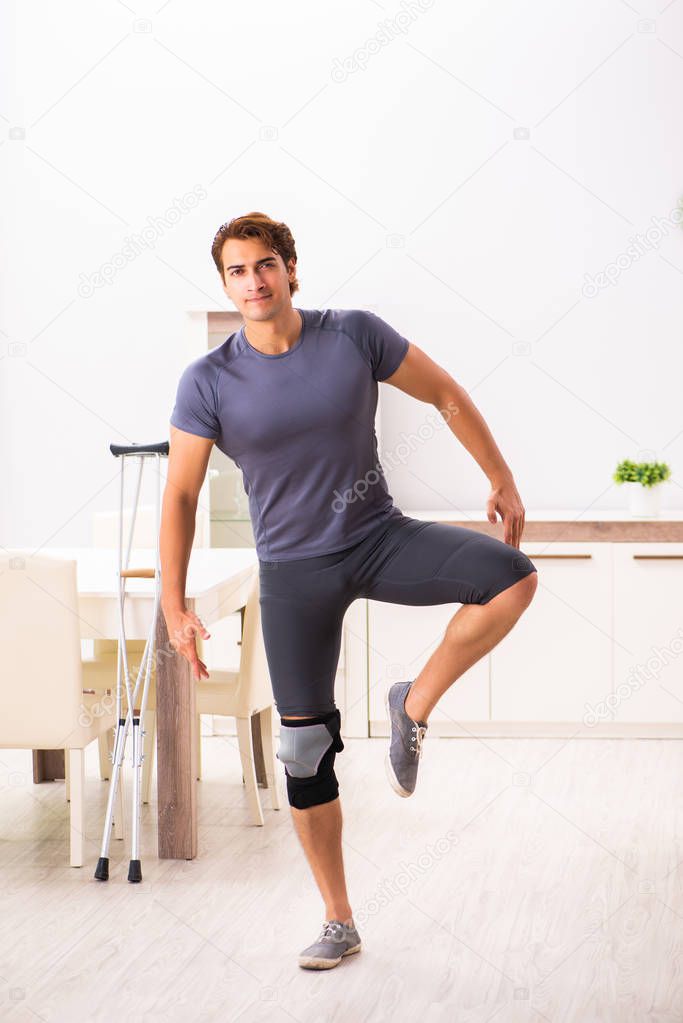 Man exercising for knee injury recovery