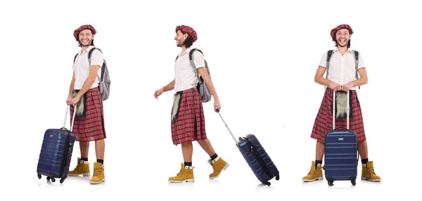 Man in scottish skirt with suitcase isolated on white — Stock Photo, Image