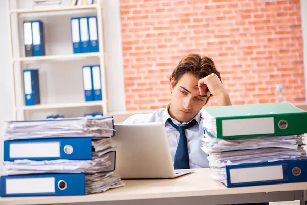 Young elegant man unhappy with too much work — Stock Photo, Image