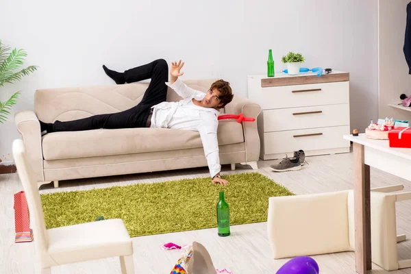 Young man having hangover after party — Stock Photo, Image