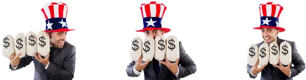 Человек в американской шляпе и мешках с деньгами — стоковое фото