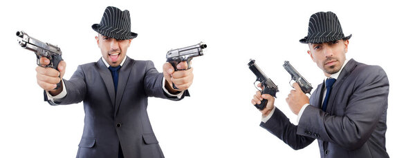 Young gangster in suit with handguns 