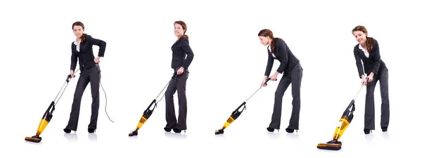 Jeune femme avec aspirateur sur blanc — Photo